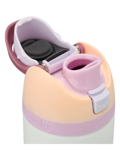 Close-up of the Owala FreeSip lid flipped open, showing the built-in straw spout and wide swig opening